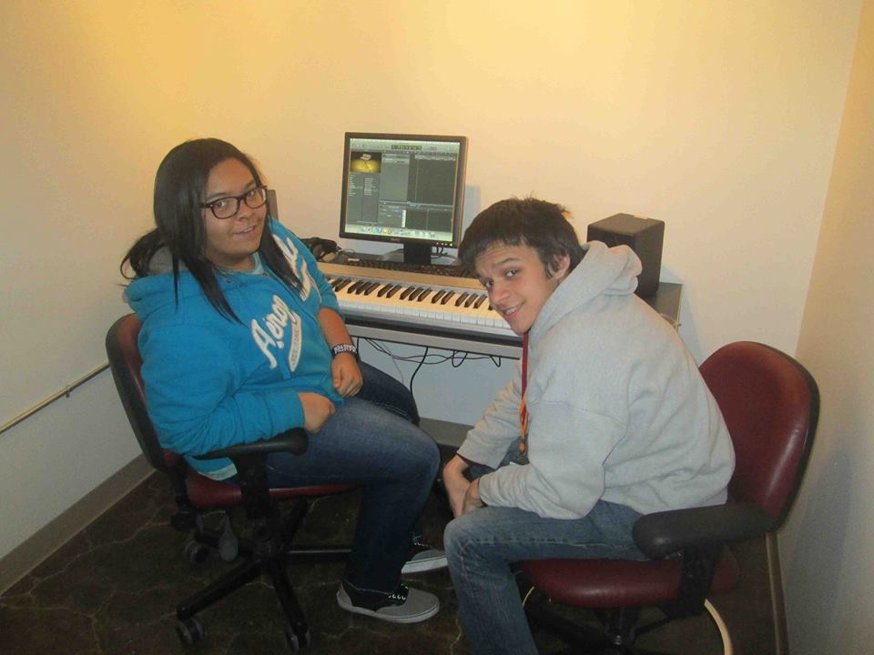 Savannah and Robbie working on her songs in IA studios in 2014